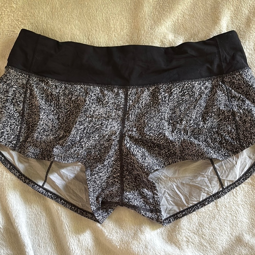 Lululemon Athletica Black and Gray Athletic Shorts with Curved Hem